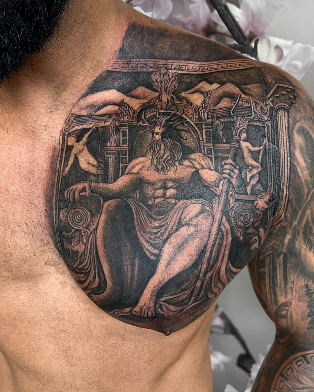 Black and grey Greek mythology chest piece