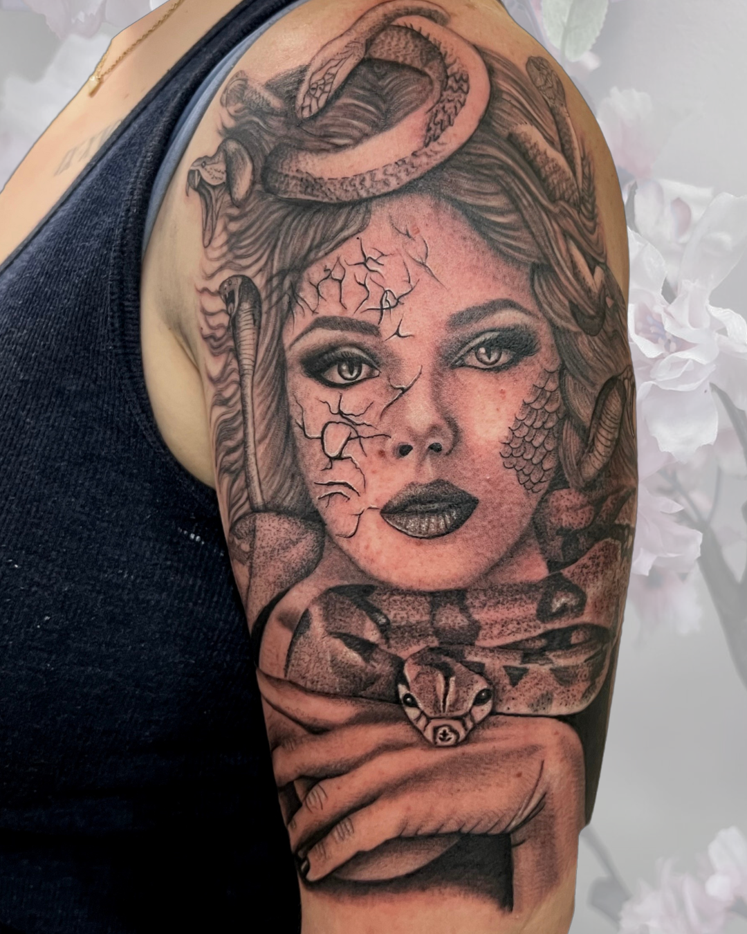 Black and grey Medusa portrait half sleeve