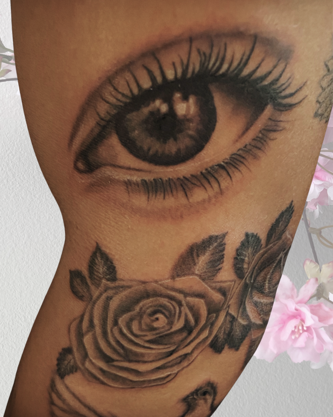 Black and grey realistic eye and rose