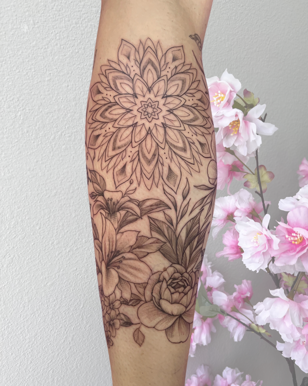 Mandala and floral forearm piece