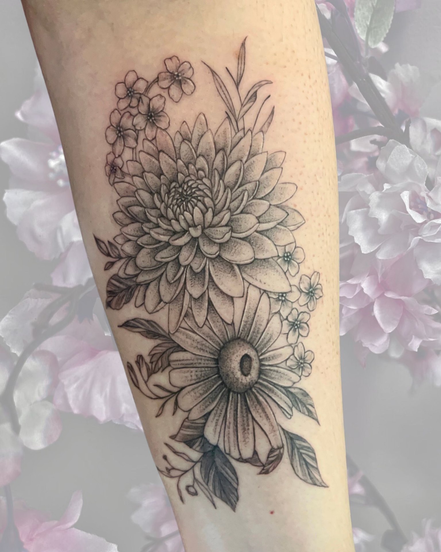 Black and grey chrysanthemum and daisy floral forearm piece